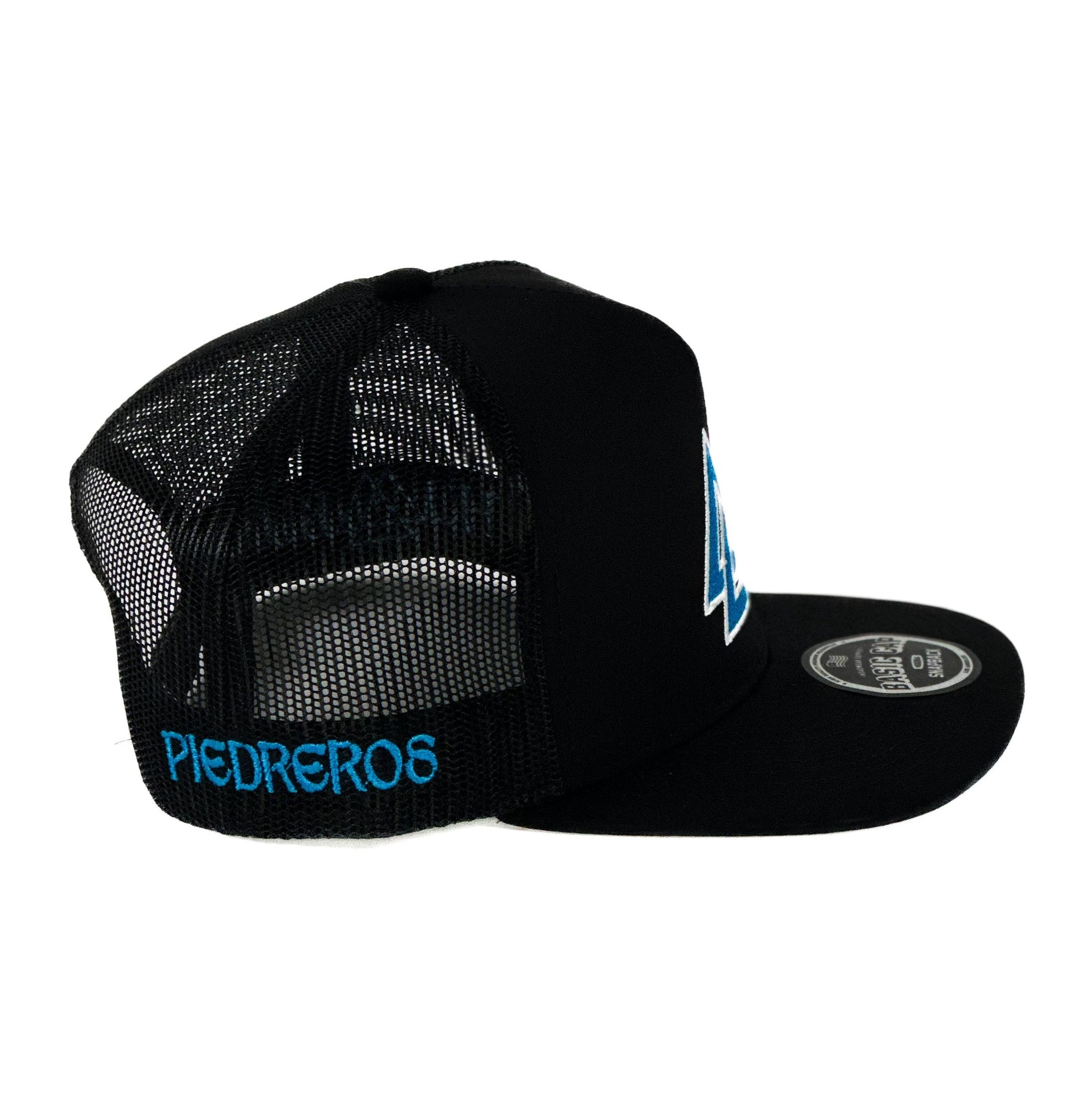Black cap with blue white cuadra piedreros triangle logo
