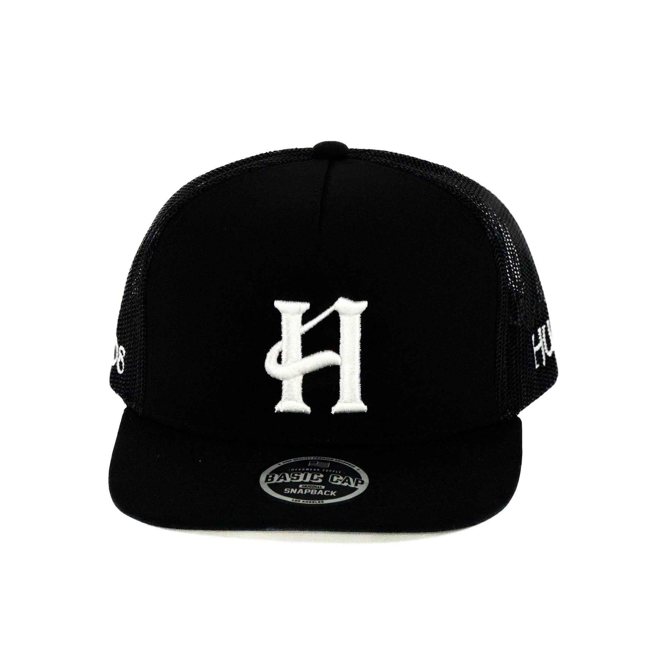 black mesh Cap with white humble cuadra piedreros logo