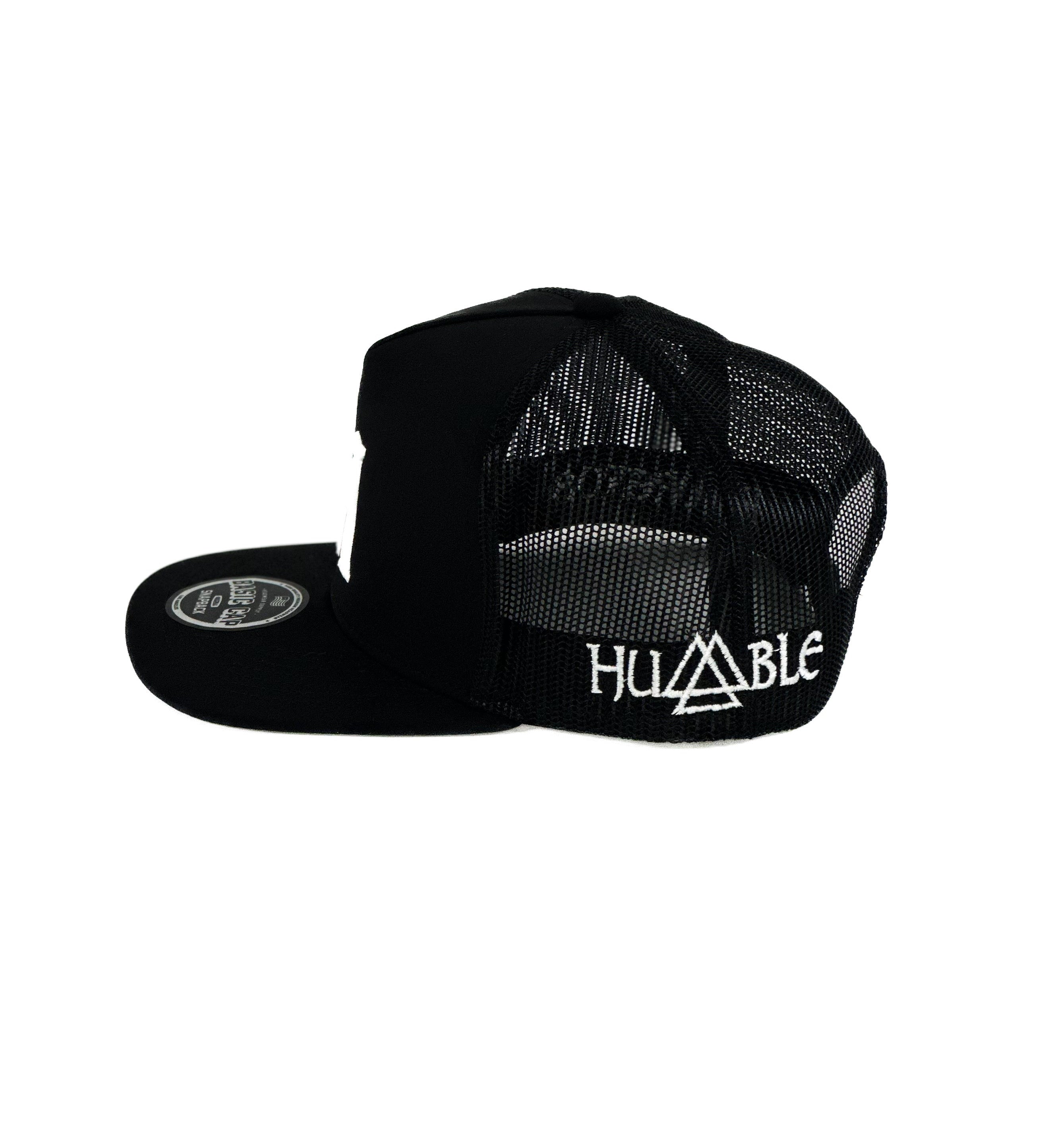 black mesh Cap with white humble cuadra piedreros logo