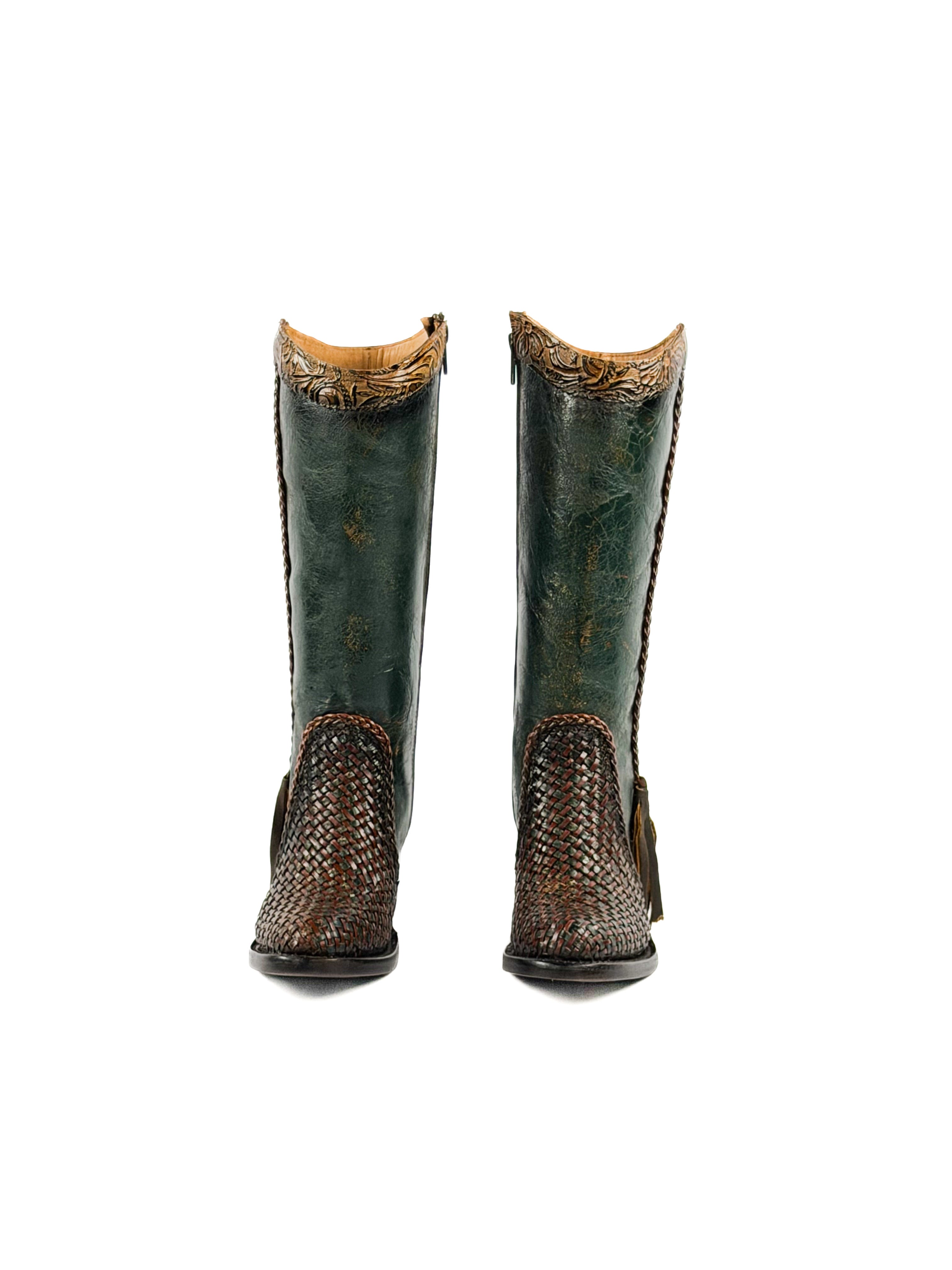 Pair of green leather boots with brown decorative elements and a 3 inch heel