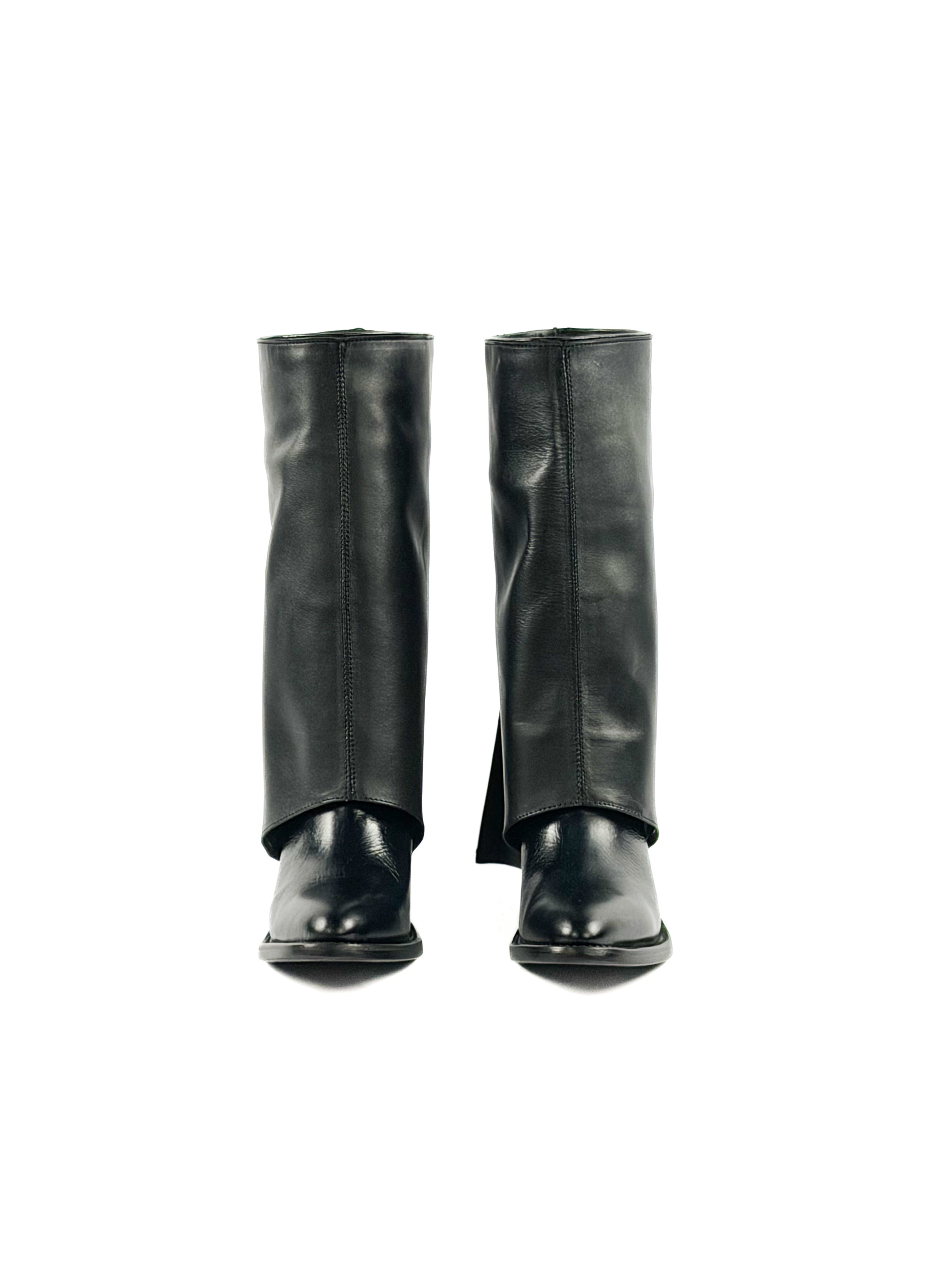 Pair of women’s black leather round toe boots