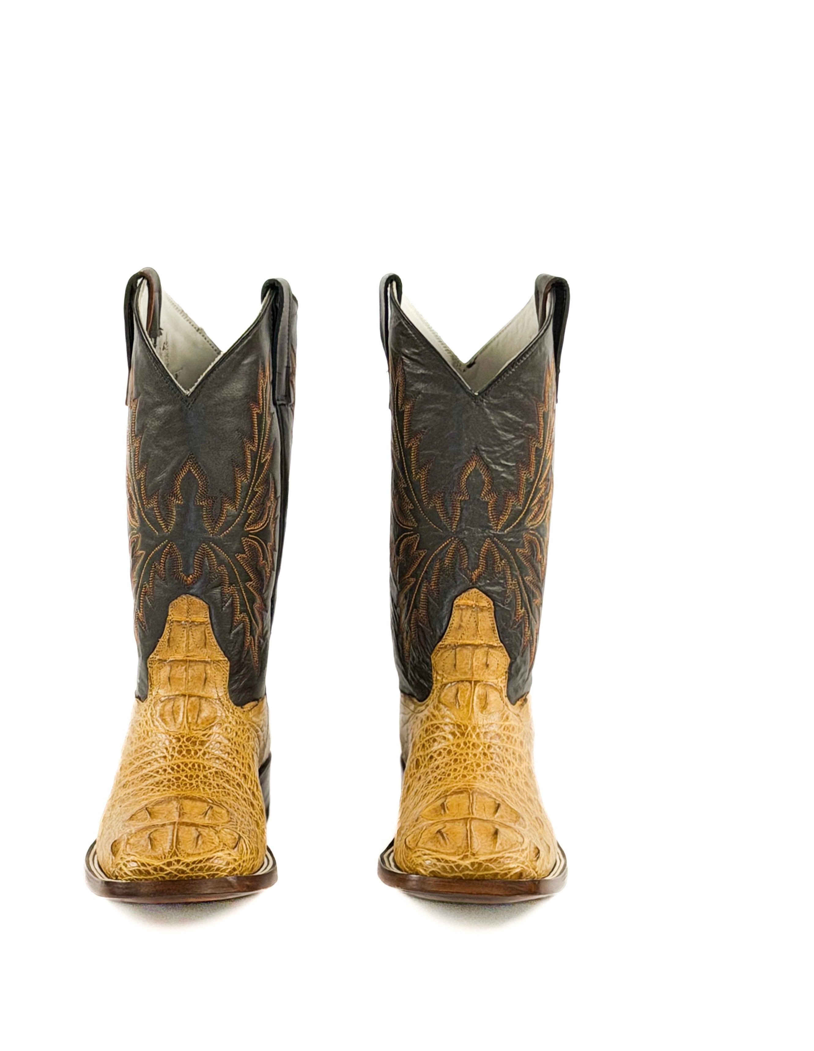 Pair of square toe cowboy boots with brown and orange design on the shaft