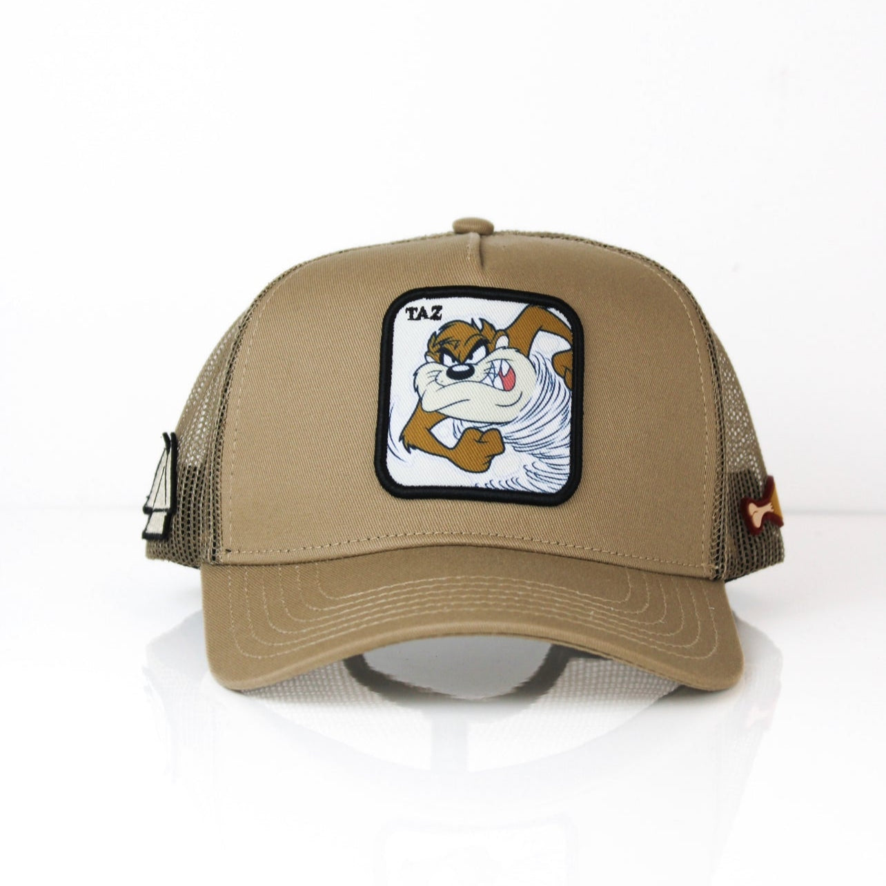 Beige trucker cap with a taz fiesty 3D patch