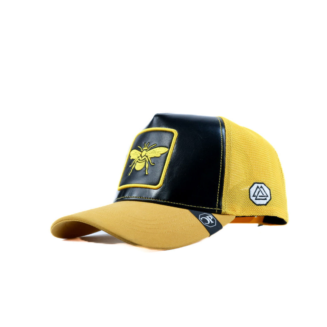 Yellow and black cap with a logo on a white background