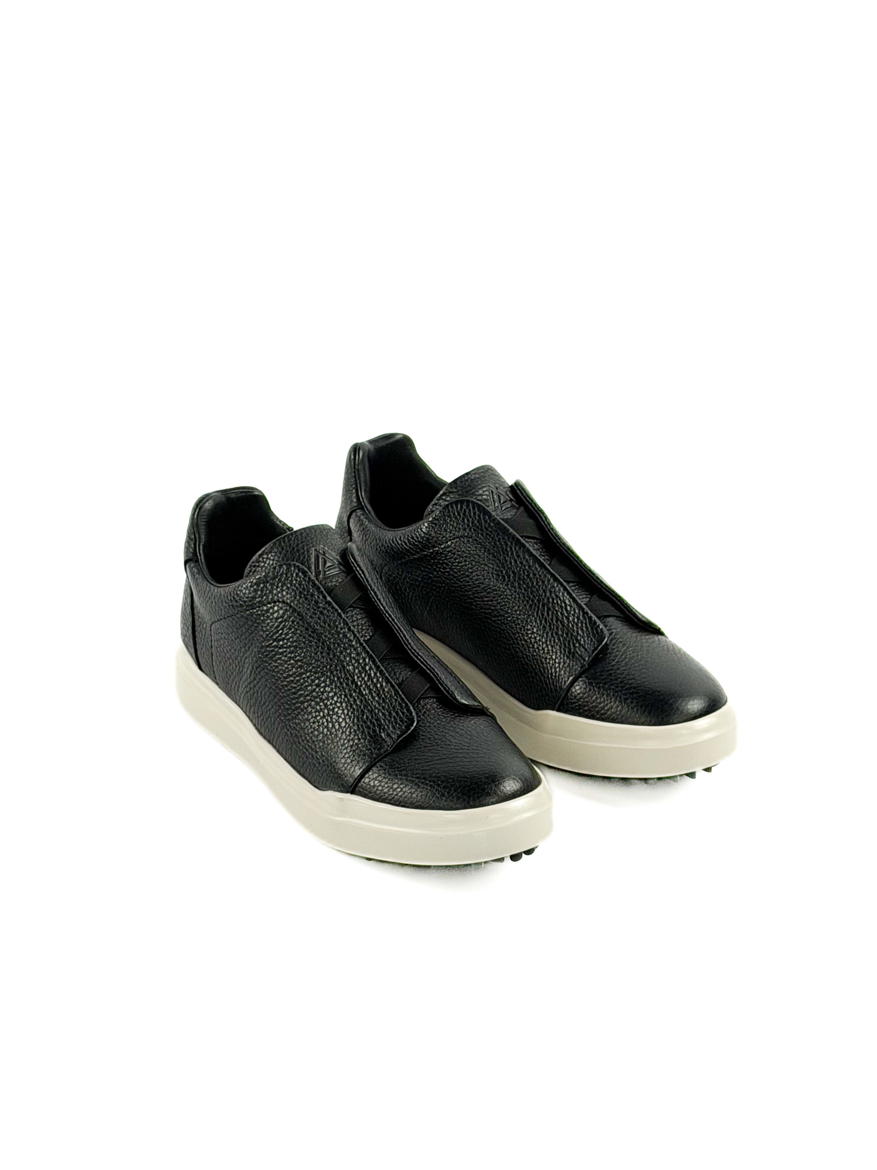 Black slip-on deer sneakers with durable traction