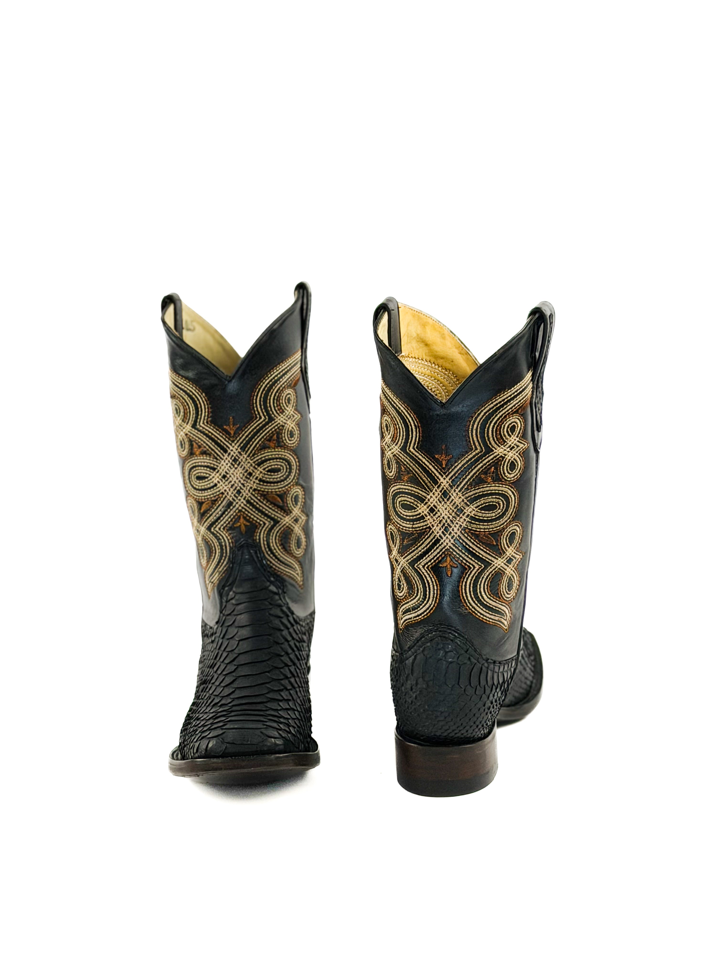 Pair of black square toe boots with gold stitching on a black upper shaft
