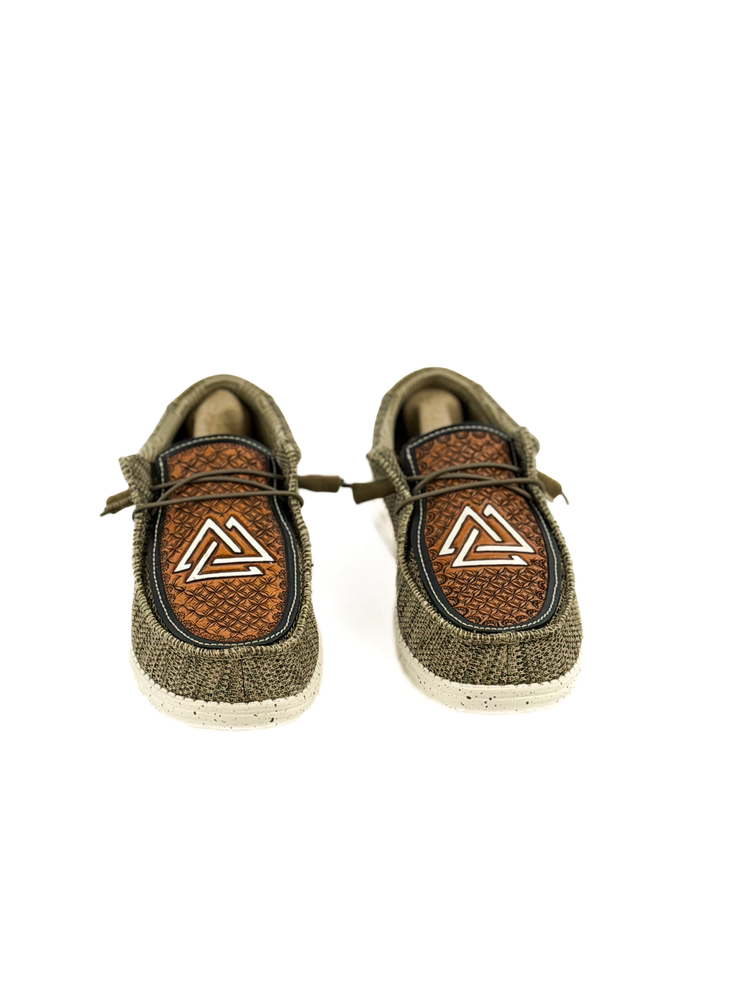 pair of olive green hey dudes hand tooled with piedreros logo