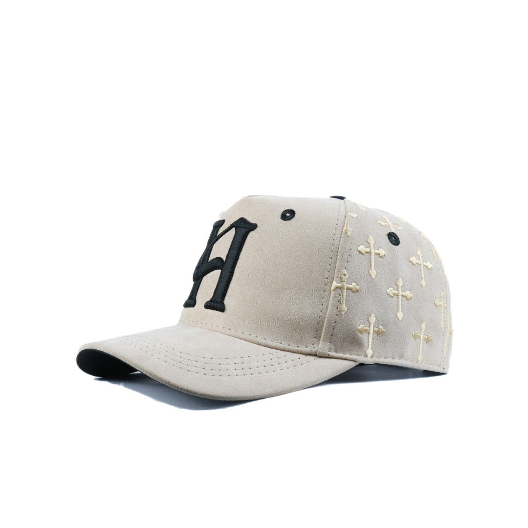 Beige cap with black and gold crosses