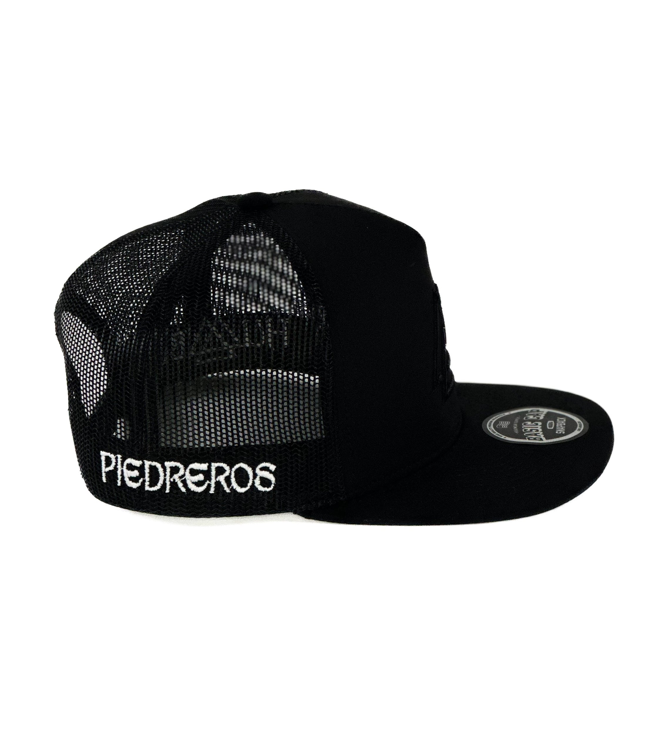 Black mesh cap with 'Piedreros' branding on the side