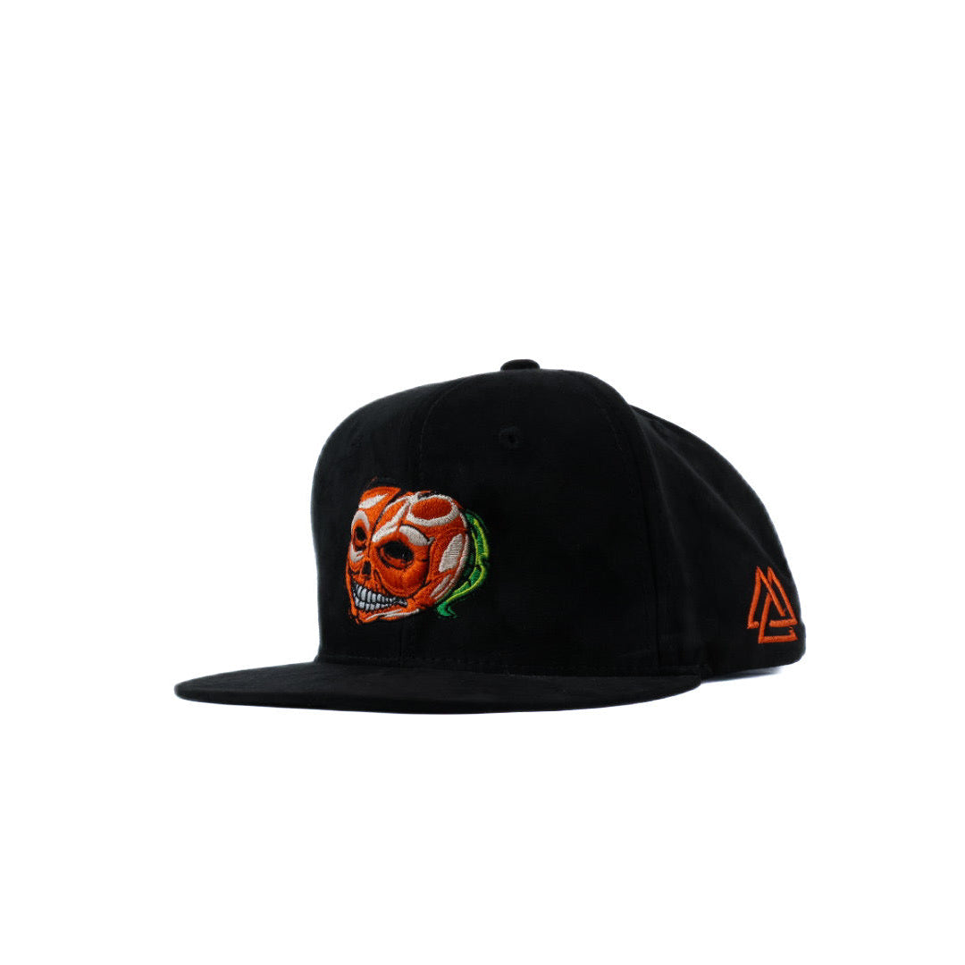 black cap with skull peach and phrase n the side