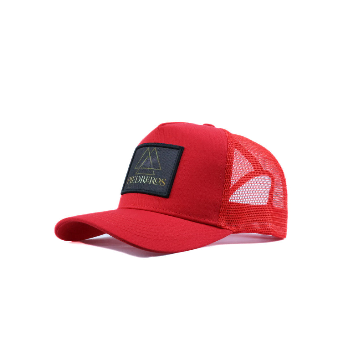 Red cap with a black patch 
