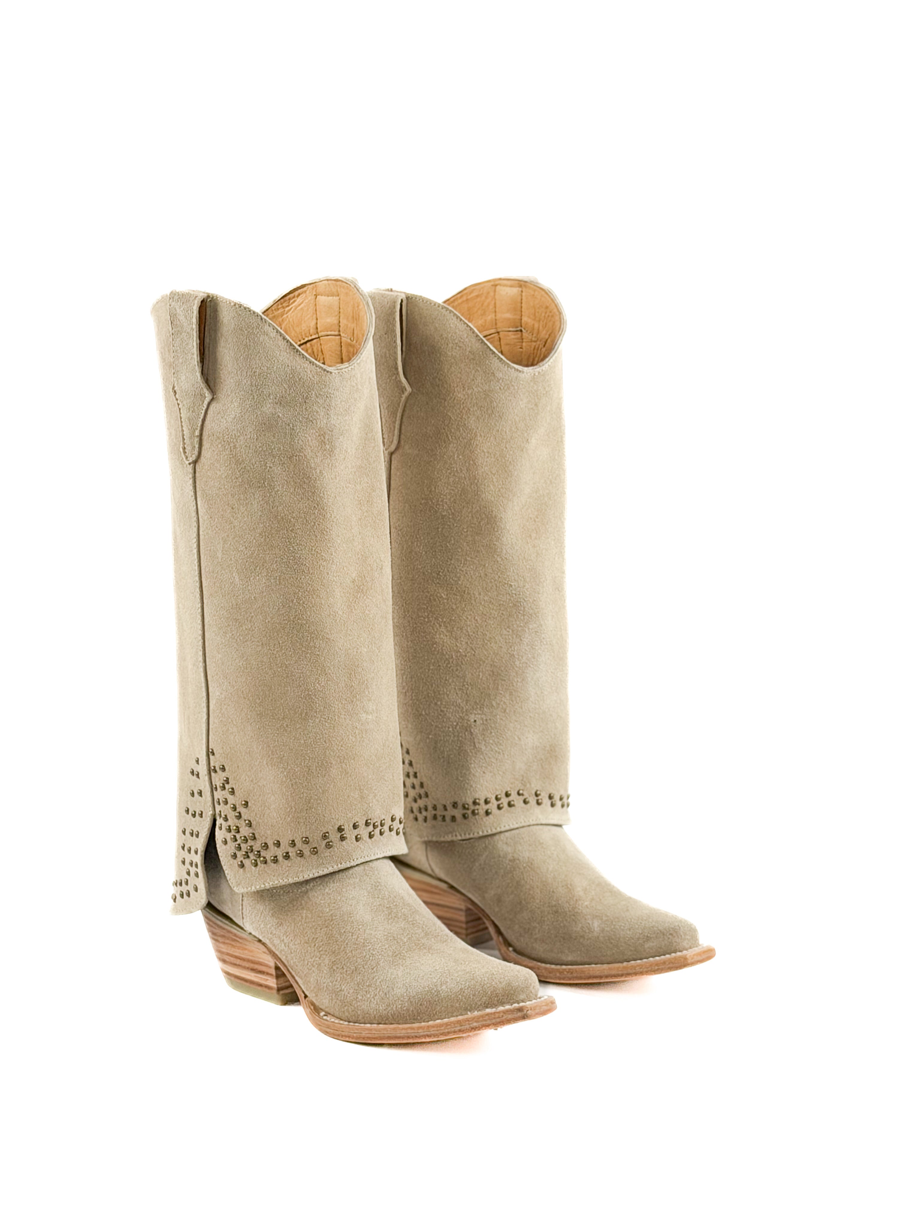Pair of beige snip toe women’s boots with studded shaft
