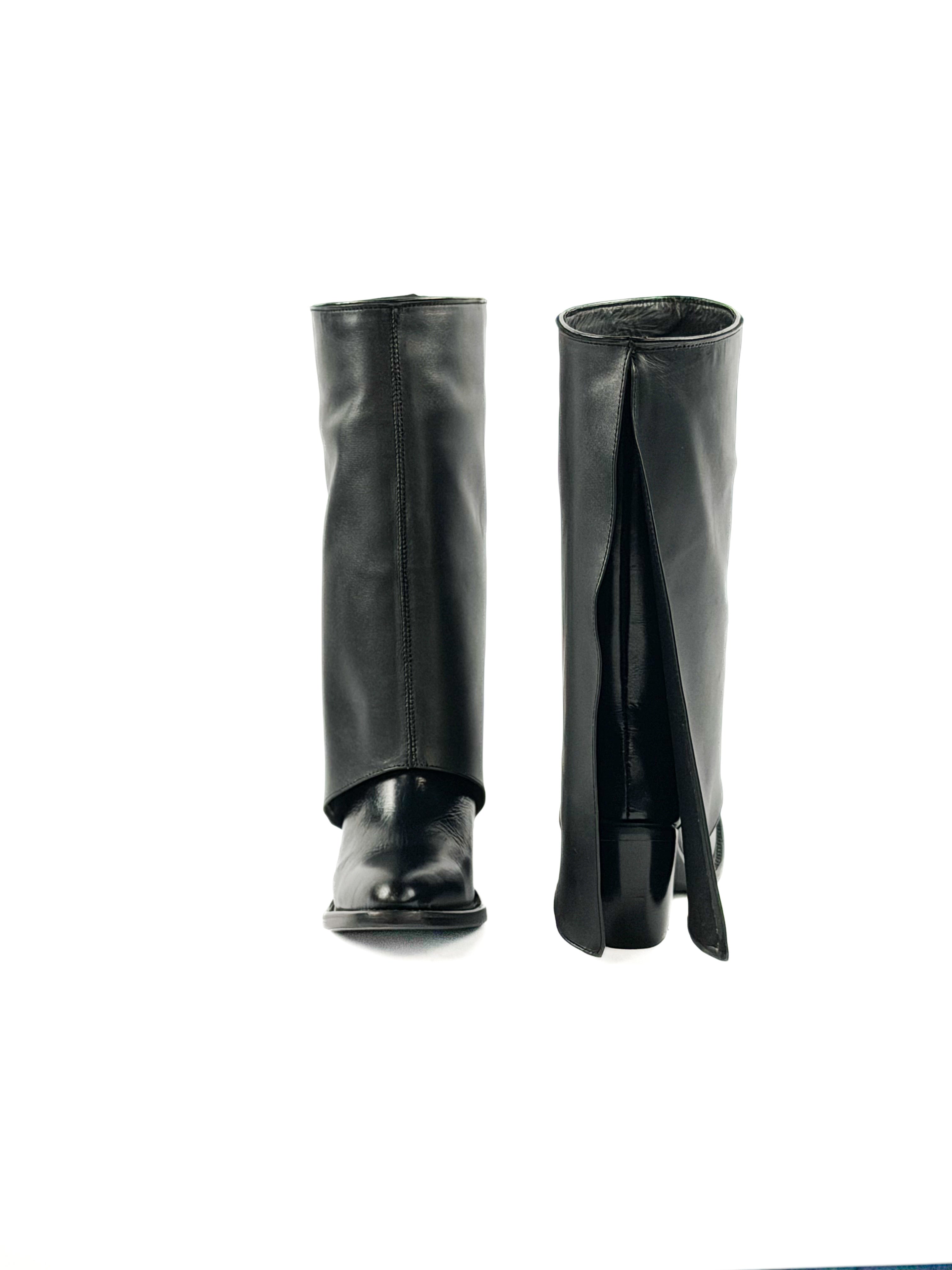 Pair of women’s black leather round toe boots