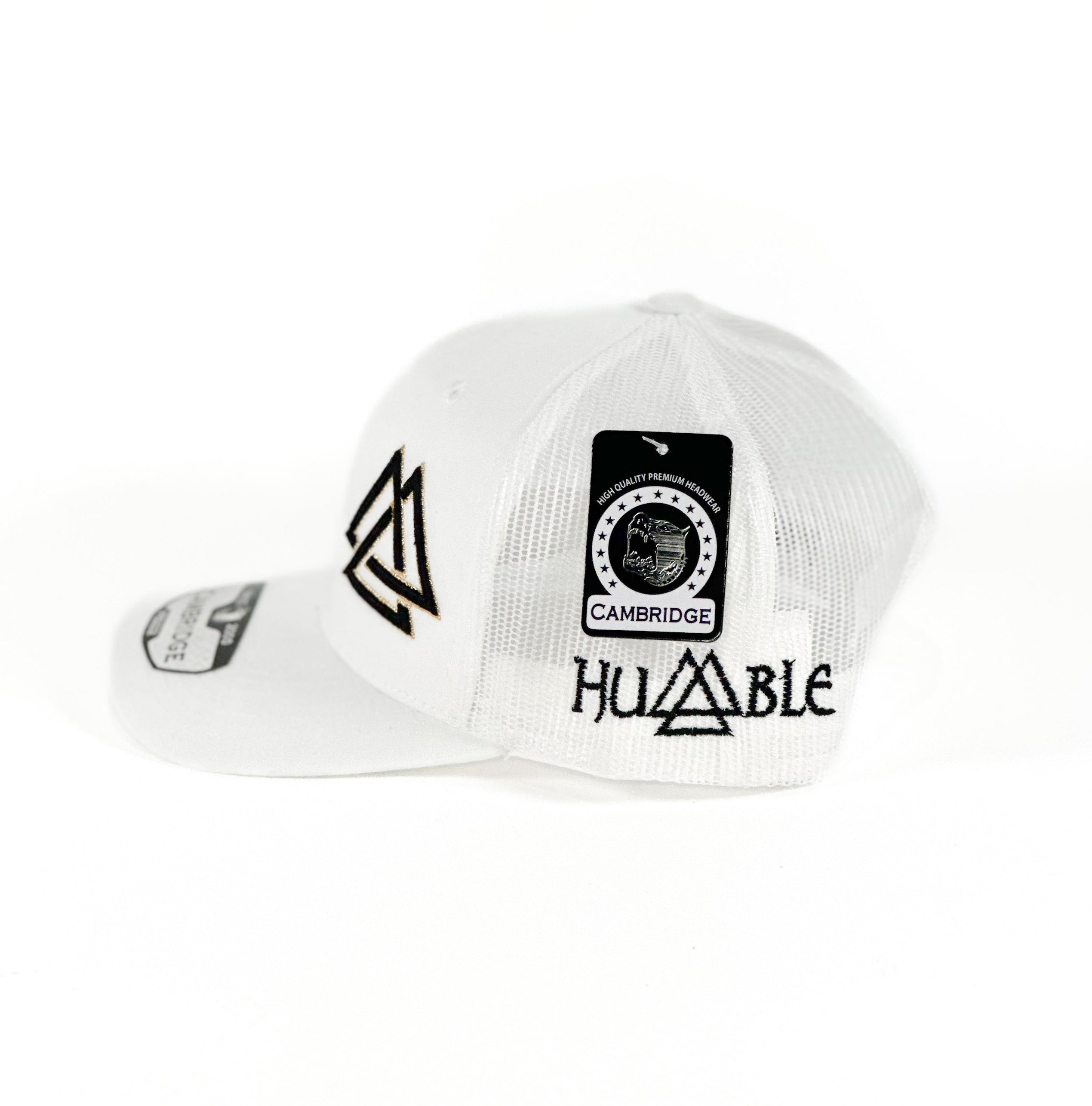 White trucker Cap with black and gold triangle cuadra piedreros logo