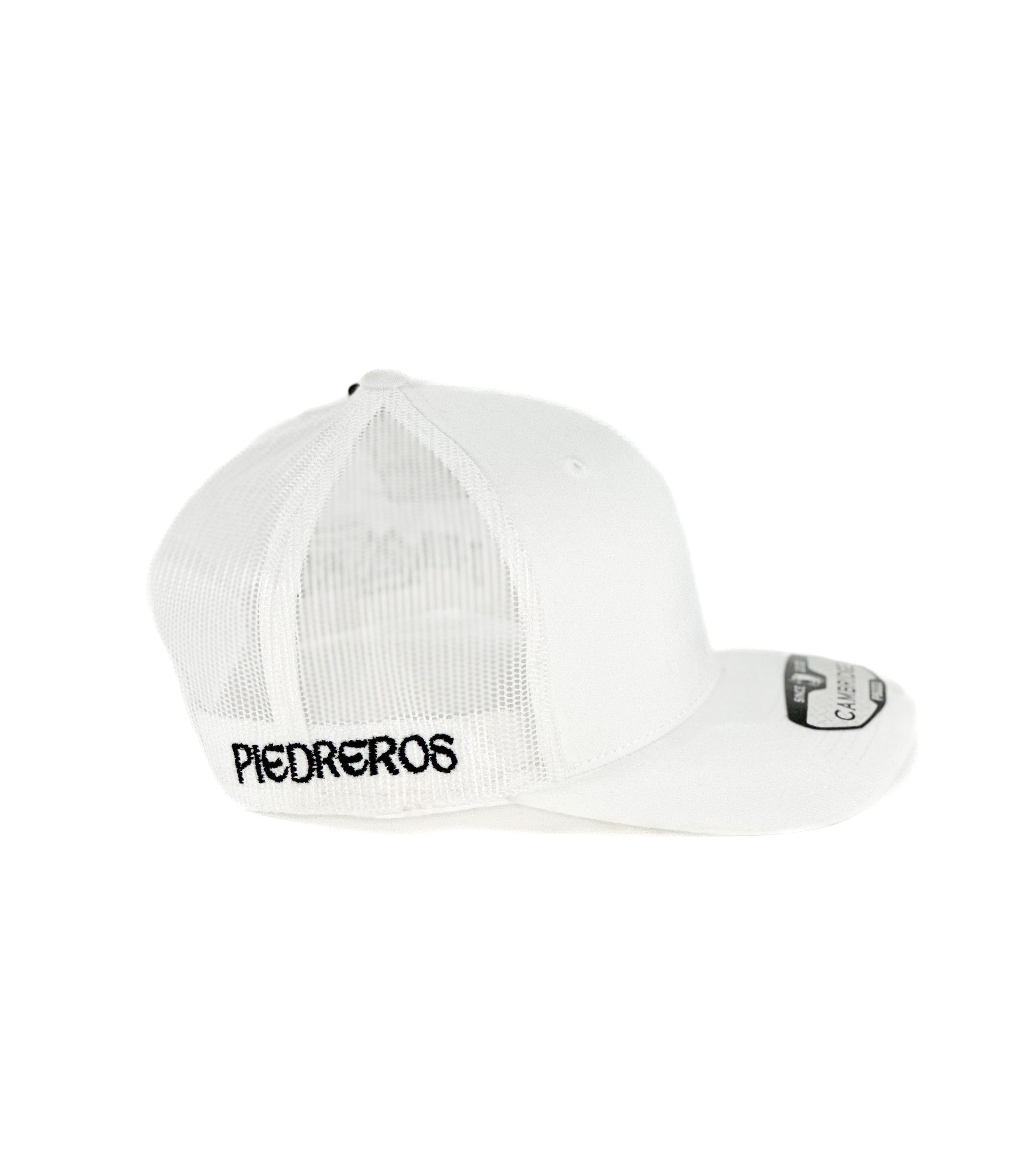 White trucker Cap with black and gold triangle cuadra piedreros logo